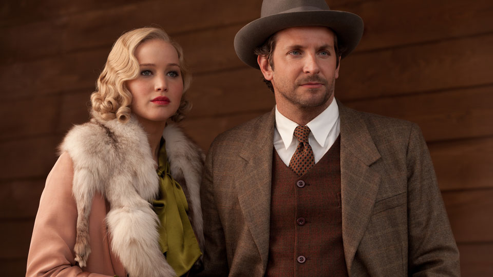 Serena (Jennifer Lawrence), George (Bradley Cooper)